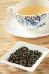 A dish of gunpowder tea. A dish of gunpowder tea.