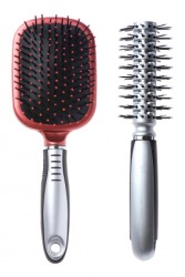 A pair of hairbrushes. A pair of hairbrushes.