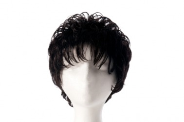 A curly black hairpiece. A curly black hairpiece.