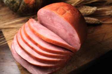 A sliced roast ham. A sliced roast ham.