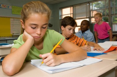 This young girl is left-handed. This young girl is left-handed.