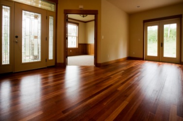 A room with hardwood floors. A room with hardwood floors.