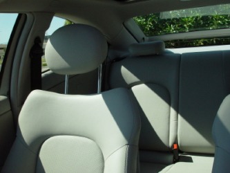 A carseat with a headrest. A carseat with a headrest.
