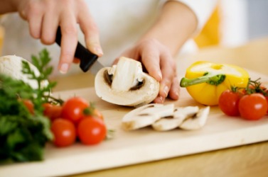 A person preparing health food. A person preparing health food.