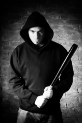 A hooligan weilding a bat. A hooligan weilding a bat.