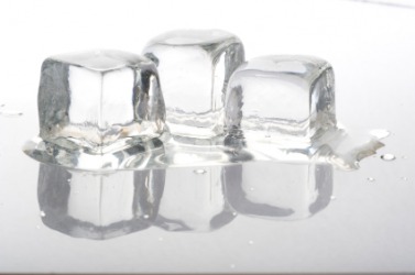 Three cubes of melting ice. Three cubes of melting ice.