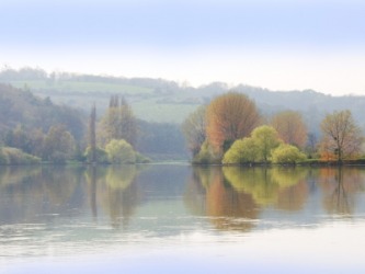 An idyllic river scene. An idyllic river scene.