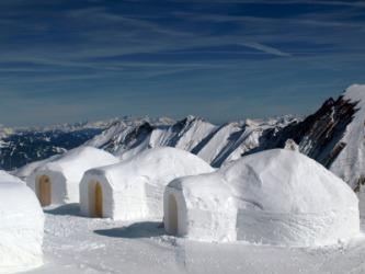 A row of igloos in the mountains. A row of igloos in the mountains.