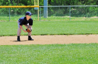 An infielder guards second base. An infielder guards second base.