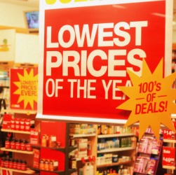 A sign to interest customers in shopping at this store. A sign to interest customers in shopping at this store.