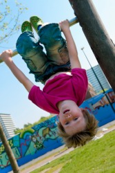 An inverted child on the playground An inverted child on the playground
