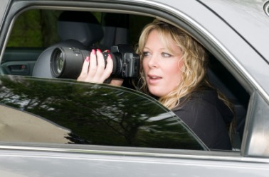 An investigator taking pictures for evidence. An investigator taking pictures for evidence.