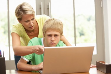 Mom is irritating her son. Mom is irritating her son.