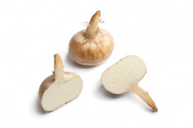 A whole and sliced jicama. A whole and sliced jicama.