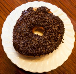 A doughnut covered with chocolate jimmies. A doughnut covered with chocolate jimmies.