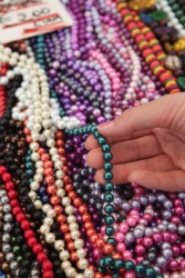 Piles of junk jewelry. Piles of junk jewelry.