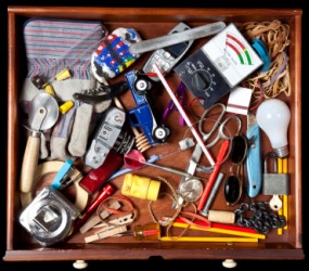 A drawer full of junk. A drawer full of junk.