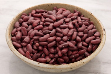 A bowl of dried kidney beans. A bowl of dried kidney beans.