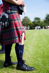 A Scotsman wearing a traditional kilt. A Scotsman wearing a traditional kilt.