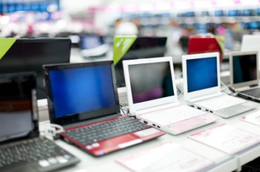 A row of laptops for sale. A row of laptops for sale.