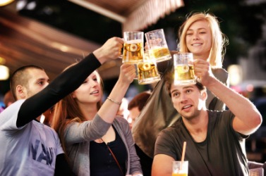 Friends enjoying a libation together. Friends enjoying a libation together.