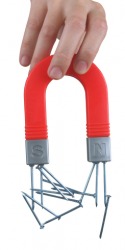 Nails being lifted with a magnet. Nails being lifted with a magnet.