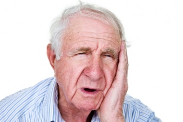 A man with a toothache moans. A man with a toothache moans.