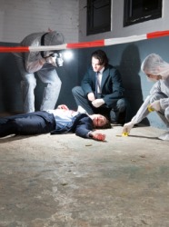Police investigate the scene of a murder. Police investigate the scene of a murder.