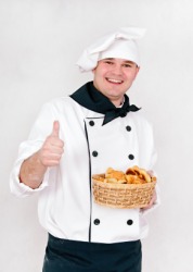 A chef wearing a black neckerchief. A chef wearing a black neckerchief.