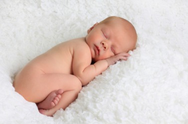 A newborn baby. A newborn baby.