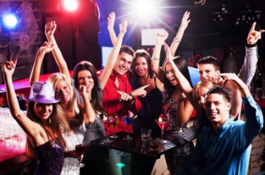People partying at a nightclub. People partying at a nightclub.