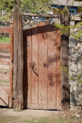 A rustic oaken door. A rustic oaken door.