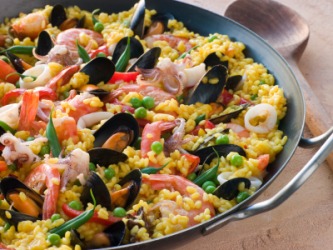 A dish of paella. A dish of paella.