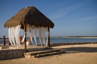 A palapa on the beach. A palapa on the beach.