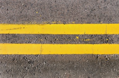 These yellow lines in the road are parallel to each other. These yellow lines in the road are parallel to each other.