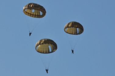 Three paratroopers in the air. Three paratroopers in the air.