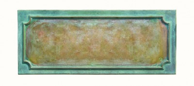 A piece of copper begins to develop a patina. A piece of copper begins to develop a patina.