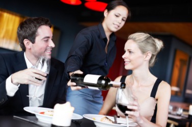 Two patrons of a restaurant enjoy a meal. Two patrons of a restaurant enjoy a meal.