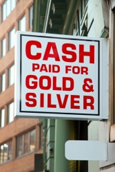 A sign outside a pawnshop. A sign outside a pawnshop.