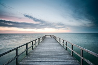 A pier at sunset. A pier at sunset.