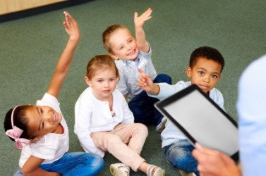 Children raise their hands to ask a question. Children raise their hands to ask a question.