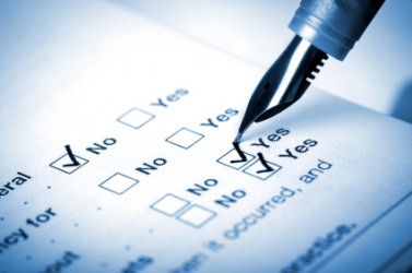 Filling out a questionnaire. Filling out a questionnaire.