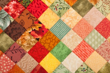 A brightly colored quilt. A brightly colored quilt.