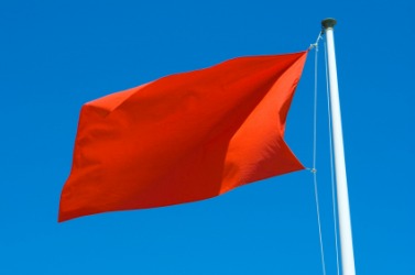 A red flag serves as a warning. A red flag serves as a warning.