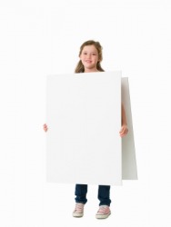 A girl wearing a blank sandwich board. A girl wearing a blank sandwich board.
