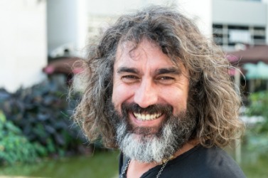 A man with a scruffy beard. A man with a scruffy beard.