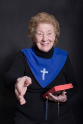 An example of sectarian is this woman welcoming you to her church. An example of sectarian is this woman welcoming you to her church.