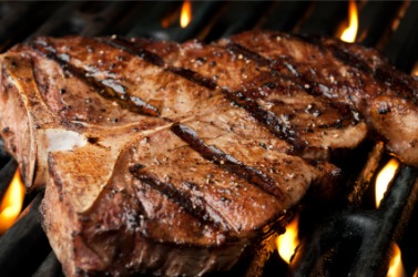 A grilled T-bone steak. A grilled T-bone steak.