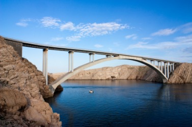 This bridge transvverses the river. This bridge transvverses the river.