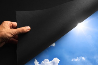 A man uncovers a picture of the sky. A man uncovers a picture of the sky.